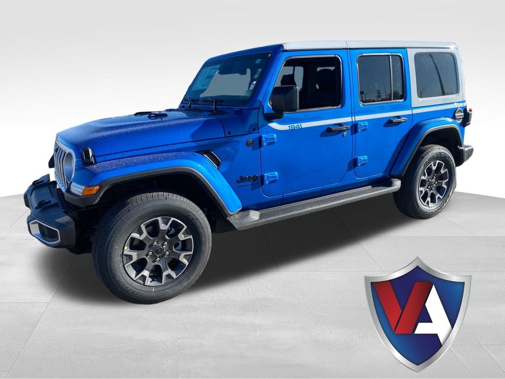 2026 Jeep Wrangler WRANGLER 4-DOOR SAHARA in Hydro Blue Pearl-Coat Exterior Paint — front three-quarter view