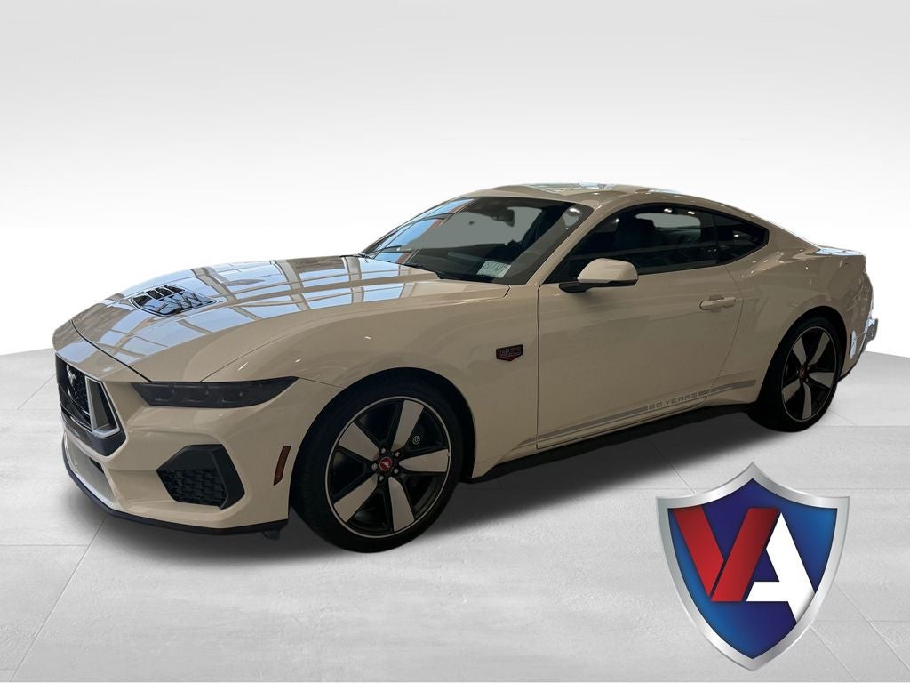 2025 Ford Mustang GT Premium 60 Year Anniversary in Wimbledon White — front three-quarter view