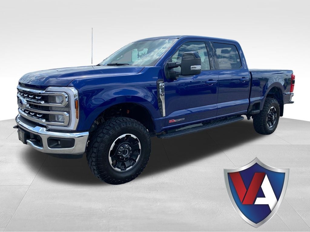 2026 Ford F-250 LARIAT in Blue Metallic — front three-quarter view