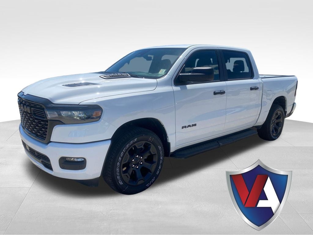 2026 RAM Ram 1500 RAM 1500 EXPRESS CREW CAB 4X4 5'7' BOX in Bright White Clear-Coat Exterior Paint — front three-quarter view